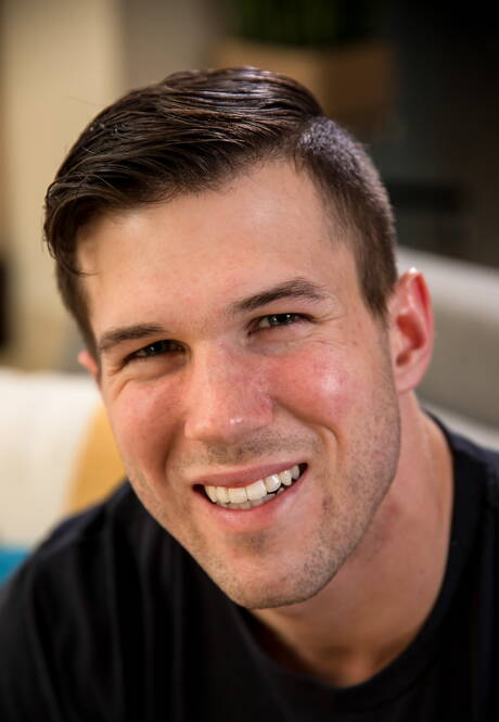 Bodybuilder Kyle Silver shows a well-build body