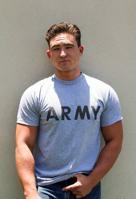 Muscular David Prime posing naked and showing tight butt outdoor