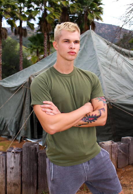 Strongman Eric Tanner posing nude outside