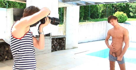 American twink Paul Mekas playing with dick outside