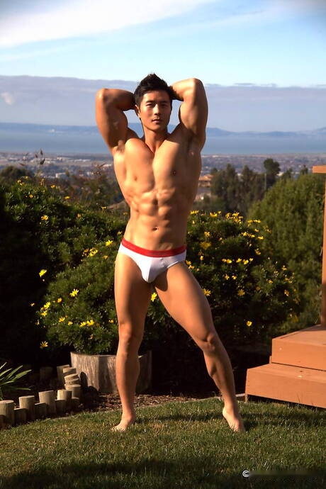 Oriental strong bull Peter Le get naked and showing nice butt outdoor