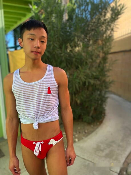 Oriental young dude Dane Jaxson masturbating with dildo at pool