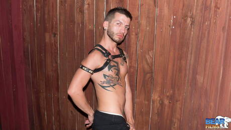 Husky guy Justin Case undressing and showing nice ass outside