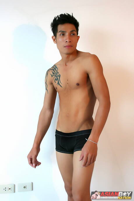 Asian strongman Rock Keng teasing his dick