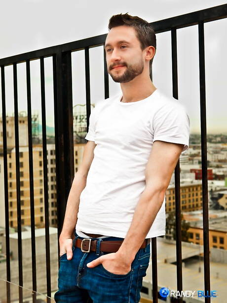 Hunky guy Ben Olsen posing naked and showing his butt outdoor