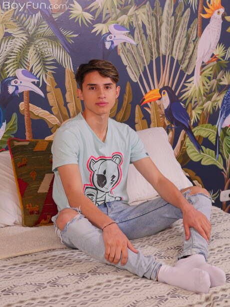 Young dude Justin Host undressing and showing tight ass